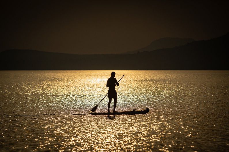 Rowing - man, lake, silhouette