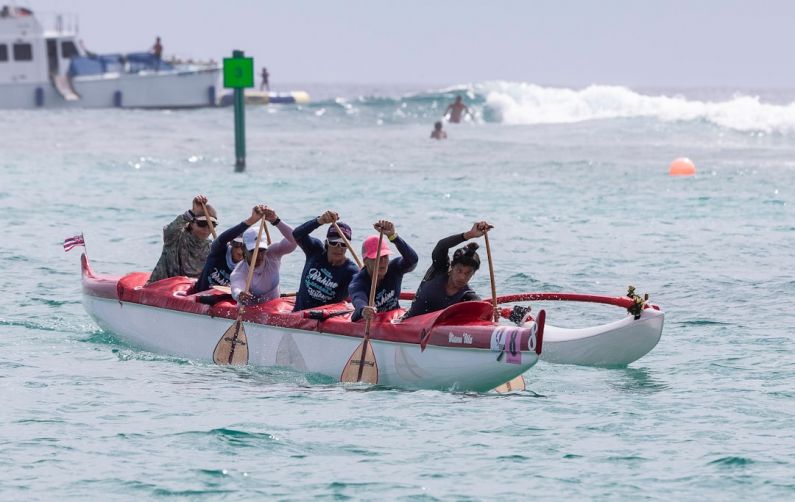 Watercraft - people riding on blue and white kayak on sea during daytime