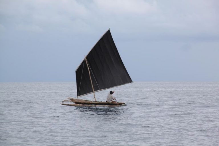 Watercraft - person riding on sailboat during daytime