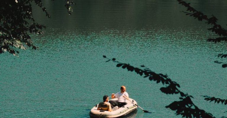 Rowing - People in Pontoon on Lake