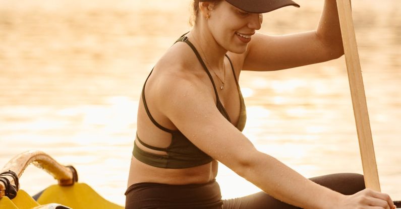 Rowing - Smiling Woman in a Kayak