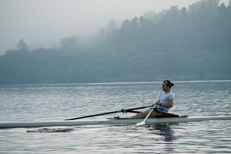 Rowing - man riding on kayak